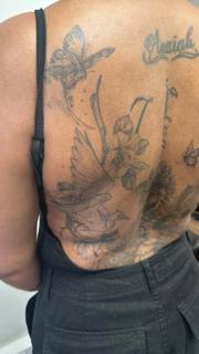 Fine line floral bird tattoo by @noka.tattoo