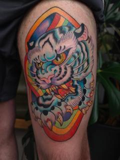 Neo-traditional rainbow tiger head tattoo by @saranna_tattoo