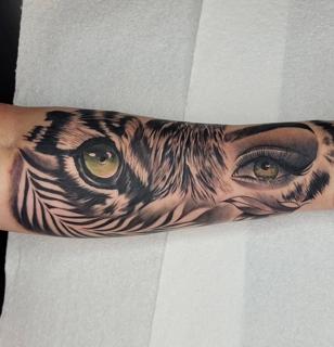 Realism tiger human eye tattoo by @sean.dwyer.tattoo