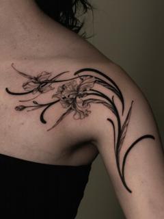 Fine line floral design tattoo by @sem_tattooer