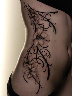 Blackwork floral design tattoo by @sem_tattooer