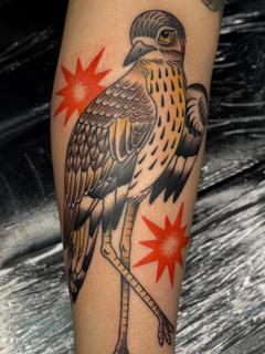 Traditional traditional bird tattoo by @sharitattoos