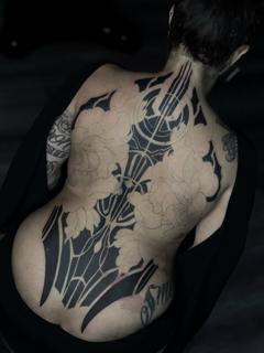 Blackwork geometric floral tattoo by @shoutone_