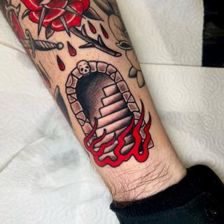 Traditional flaming staircase tattoo by @sjlant
