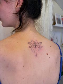 Fine line dragonfly tattoo by @soso_tattoo.hk
