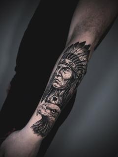 Realism native chief eagle tattoo by @delavina.ttt