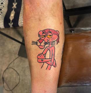 Cartoon pink panther tattoo by @shuhari_tattoo
