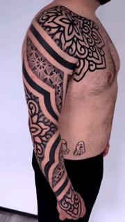 Blackwork geometric sleeve tattoo by @staceytattoos