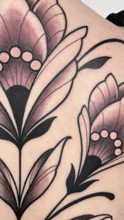 Blackwork floral design tattoo by @staceytattoos