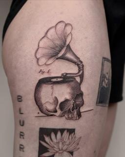 Dotwork skull gramophone tattoo by @_avlamis