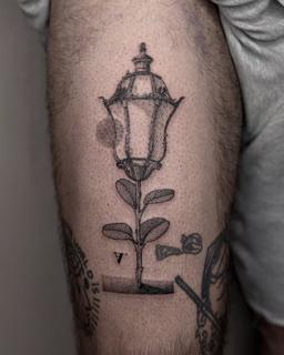 Fine line lamp rose tattoo by @_avlamis