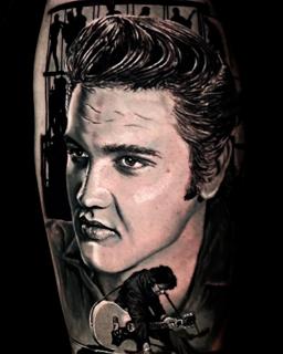 Realism musician portrait tattoo by @stefan.catalin.druga