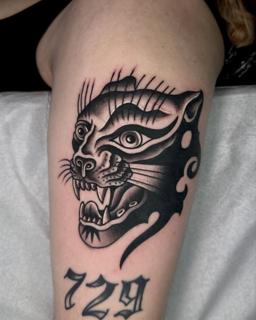 Traditional panther head tattoo by @stef_mits_tattoo