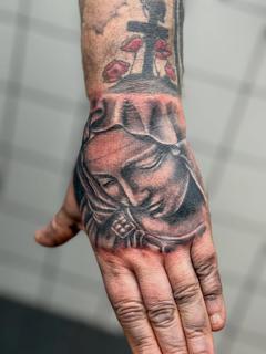 Realism religious figure tattoo by @tattoozbysteve