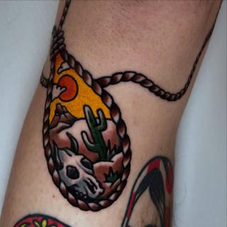 Traditional desert scene tattoo by @stoyjunx