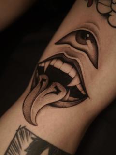 Realism eye mouth tattoo by @sylvia__ink