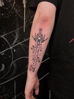 Fine line floral sword tattoo by @goretattoos
