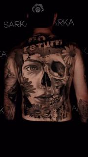 Realism floral skull tattoo by @thanos_stokas_tattoo