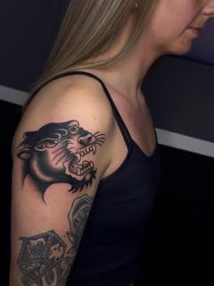 Traditional roaring panther tattoo by @broy_tattooer