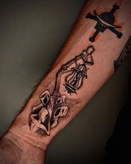 Illustrative creature with lantern tattoo by @inkeepertattooathens