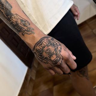 Traditional roaring tiger tattoo by @titotattooart_