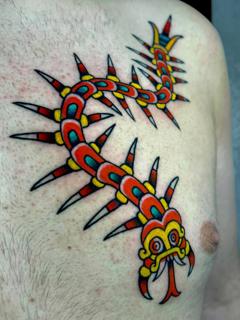 Traditional tribal centipede tattoo by @tsosme_teza