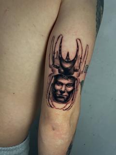 Realism beetle face tattoo by @zachosink