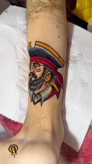 Traditional pirate portrait tattoo by @vasso_lowbrow