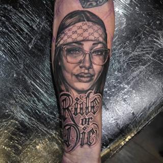 Realism woman portrait tattoo by @vividinkbirmingham