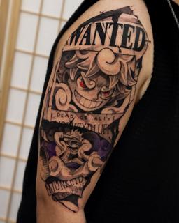 Anime luffy wanted poster tattoo by @vitoortattoo