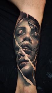 Realism surreal portrait tattoo by @wilkendorftattoo