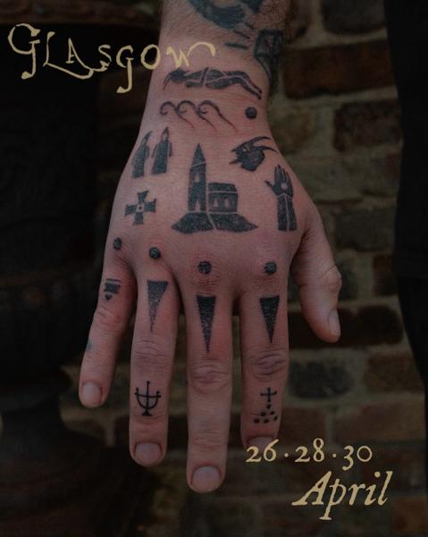 Blackwork abstract symbols tattoo by @2can.tattooer
