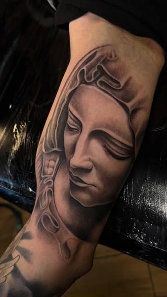 Realism sculpture face tattoo by @filippidis_tattoo