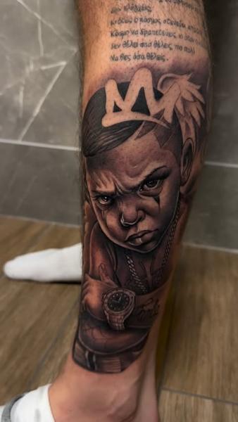 Realism child with crown tattoo by @filippidis_tattoo