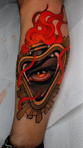 Traditional flaming eye tattoo by @_hamiltontattoo