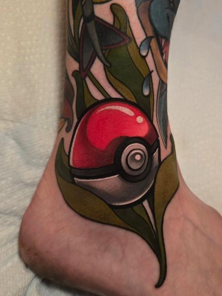 Traditional pokeball tattoo by @_hamiltontattoo