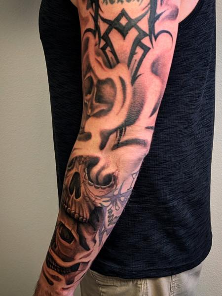 Realism skull sleeve tattoo by @_lashawnrose