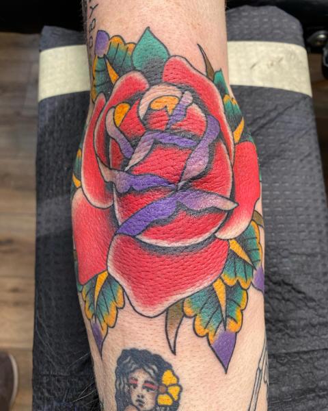 Traditional traditional rose tattoo by @a_crockertattoo