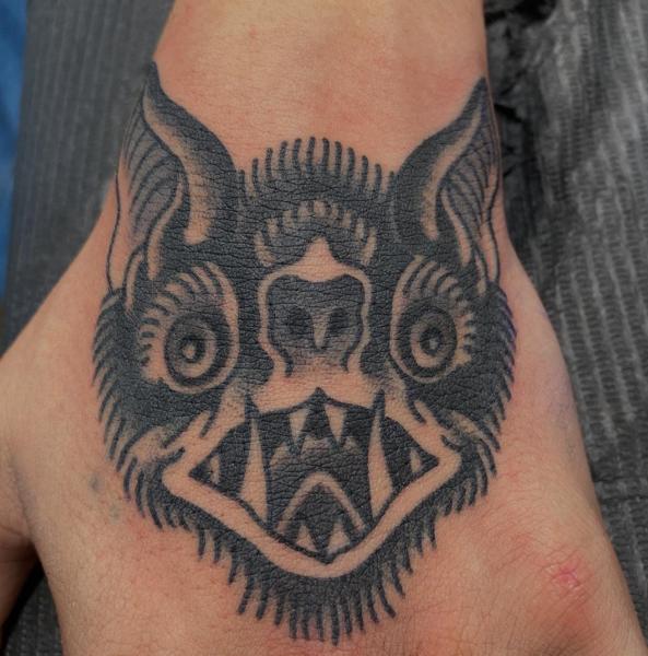 Blackwork abstract face tattoo by @a_crockertattoo