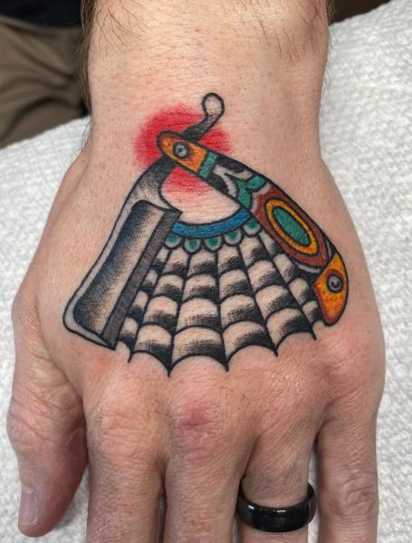 Traditional straight razor tattoo by @a_crockertattoo