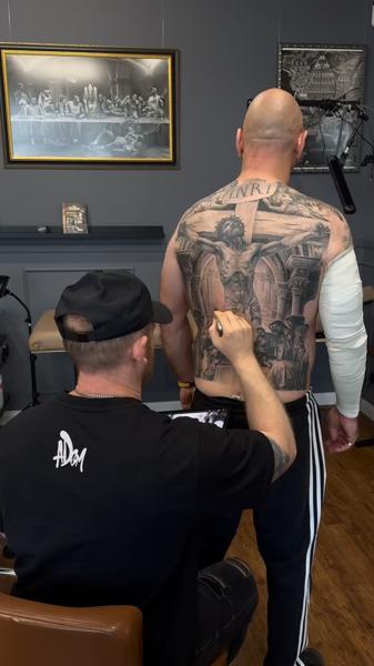 Realism crucifixion scene tattoo by @a_dem_tattooartist