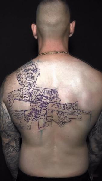 Linework gun-wielding figure tattoo by @a_dem_tattooartist