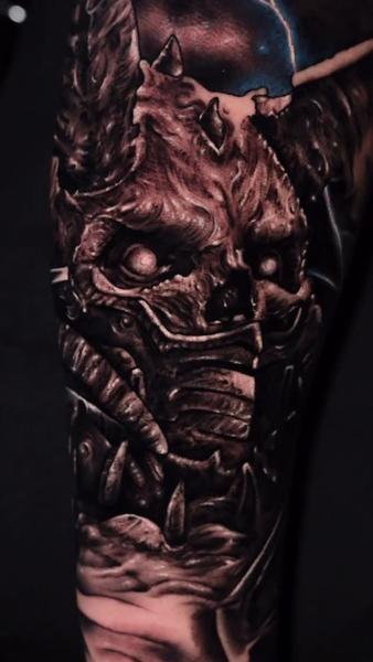 Realism demonic face tattoo by @abraham.tattooist