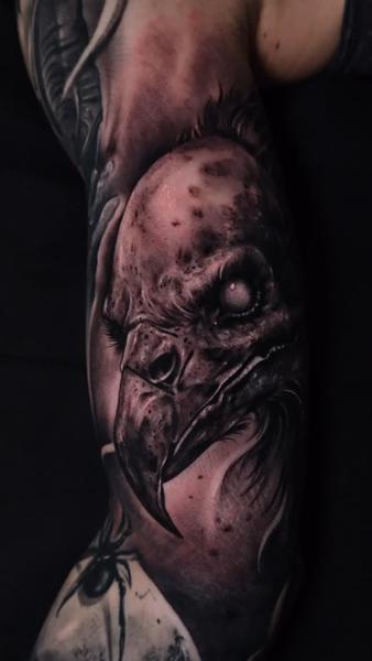 Realism bird skull tattoo by @abraham.tattooist