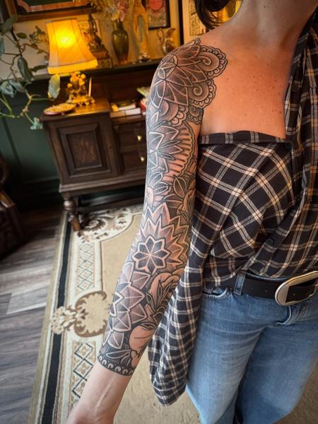 Blackwork geometric floral tattoo by @acrookedtattoo