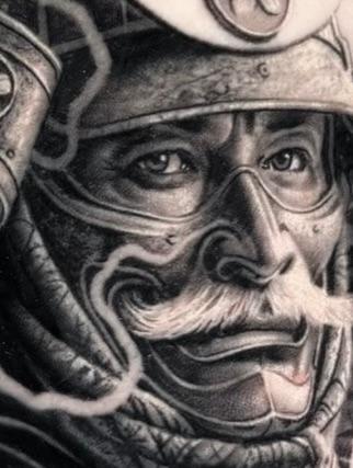 Realism samurai portrait tattoo by @adamblakeytattoos