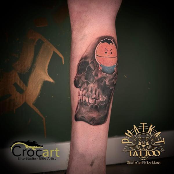 Realism skull cartoon tattoo by @adelepktattoo