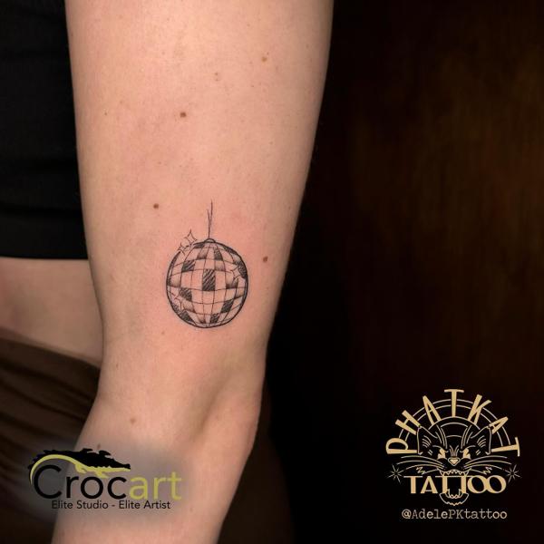 Fine Line disco ball tattoo by @adelepktattoo