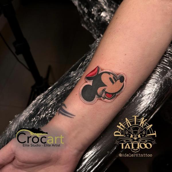 Cartoon mickey mouse tattoo by @adelepktattoo
