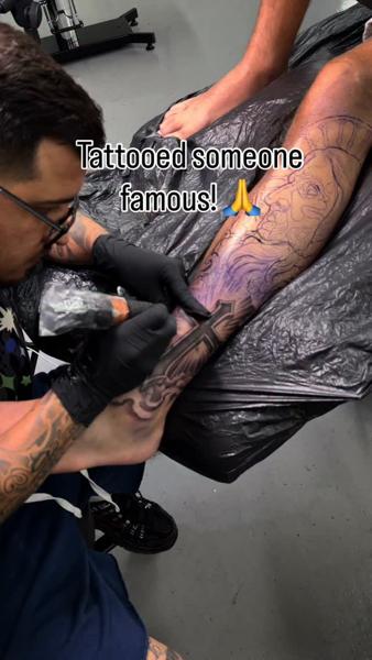Realism cross and face tattoo by @adtattoos